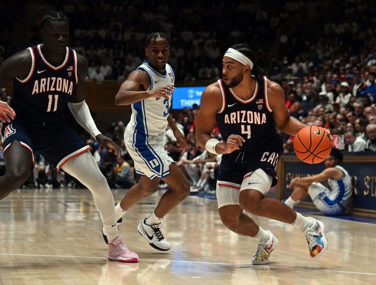 Nov 10, 2023; Durham, North Carolina, USA;  Arizona Wildcats guard Kylan Boswell (4) controls the ball during the first half against the Duke Blue Devils at Cameron Indoor Stadium.