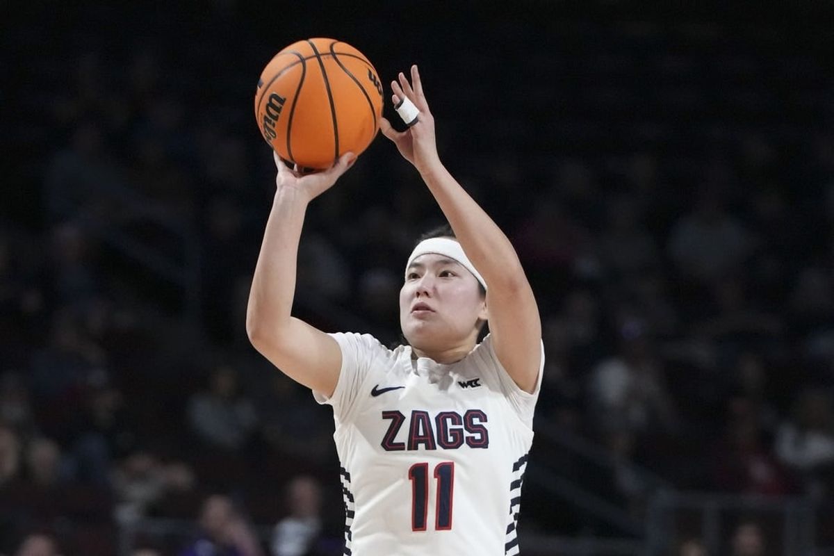 March 12, 2024; Las Vegas, NV, USA; Gonzaga Bulldogs guard Kayleigh Truong (11) shoots the basketball against the Portland Pilots during the second half in the finals of the WCC Basketball Championship at Orleans Arena.