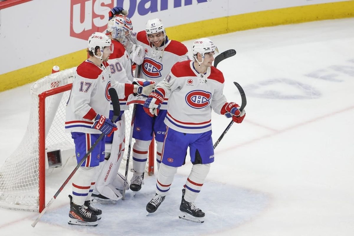 Dec 22, 2023; Chicago, Illinois, USA; Montreal Canadiens goaltender Cayden Primeau (30) celebrates with teammates after defeating the Chicago Blackhawks at United Center.