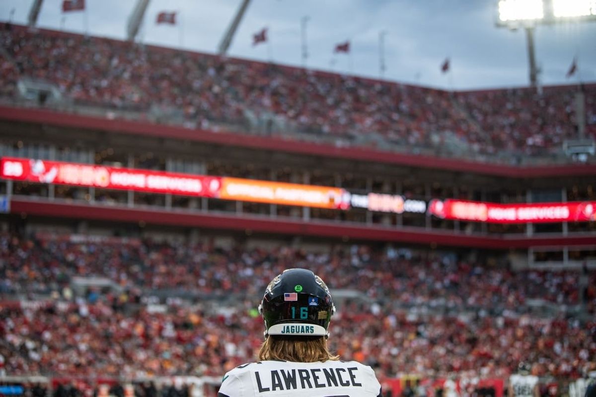 Dec 24, 2023; Tampa, Florida, USA; Jacksonville Jaguars quarterback Trevor Lawrence (16) on the sideline against the Tampa Bay Buccaneers in the third quarter at Raymond James Stadium.