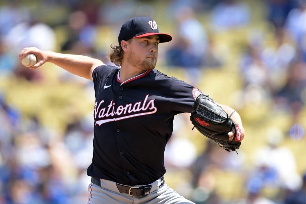 Apr 17, 2024; Los Angeles, California, USA; Washington Nationals pitcher Jake Irvin (27) throws to the plate in the third inning against the Los Angeles Dodgers at Dodger Stadium.