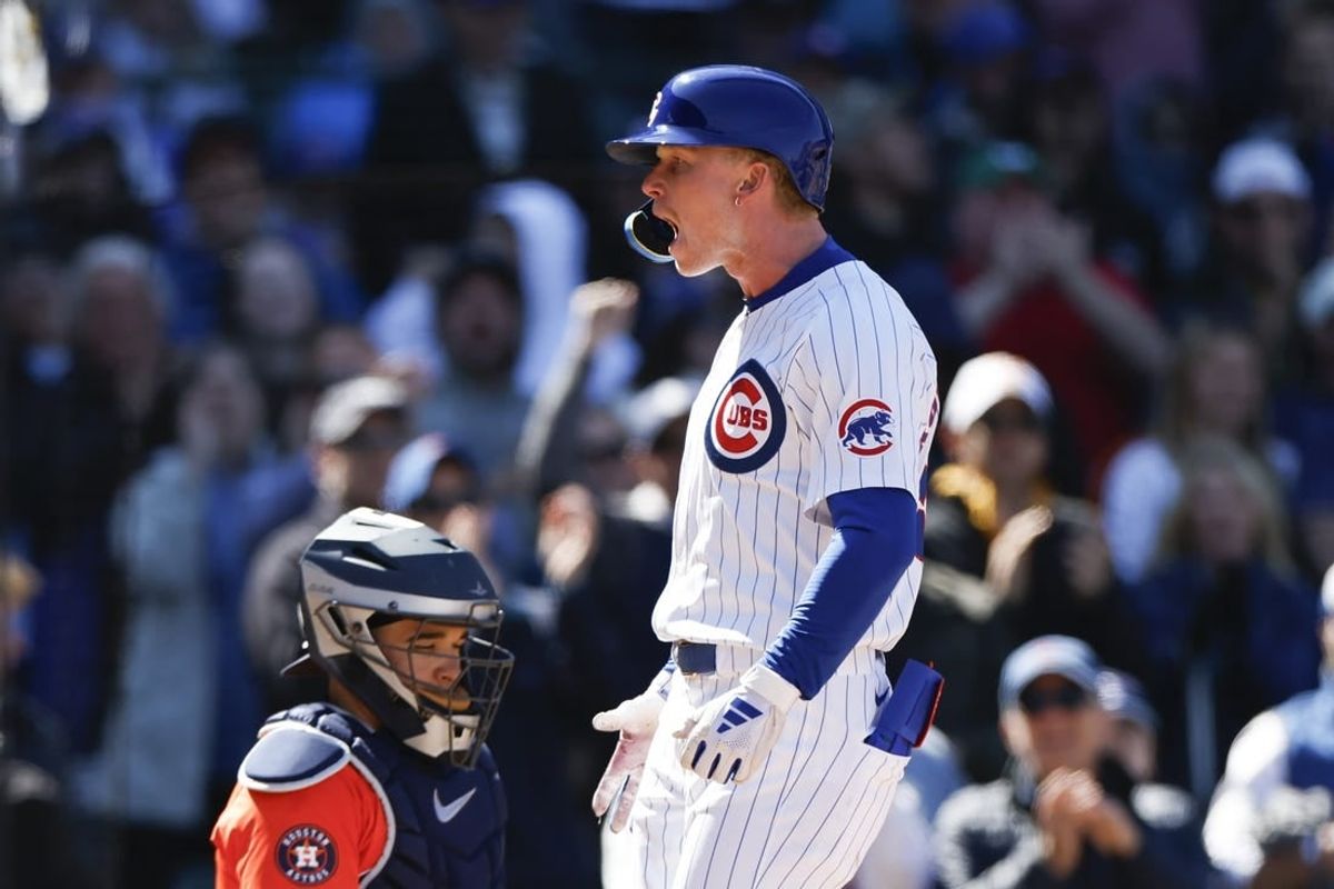 Apr 25, 2024; Chicago, Illinois, USA; Chicago Cubs centerfielder Pete Crow-Armstrong (52) celebrates as he crosses home plate after hitting a two-run home run against the Houston Astros during the sixth inning at Wrigley Field.