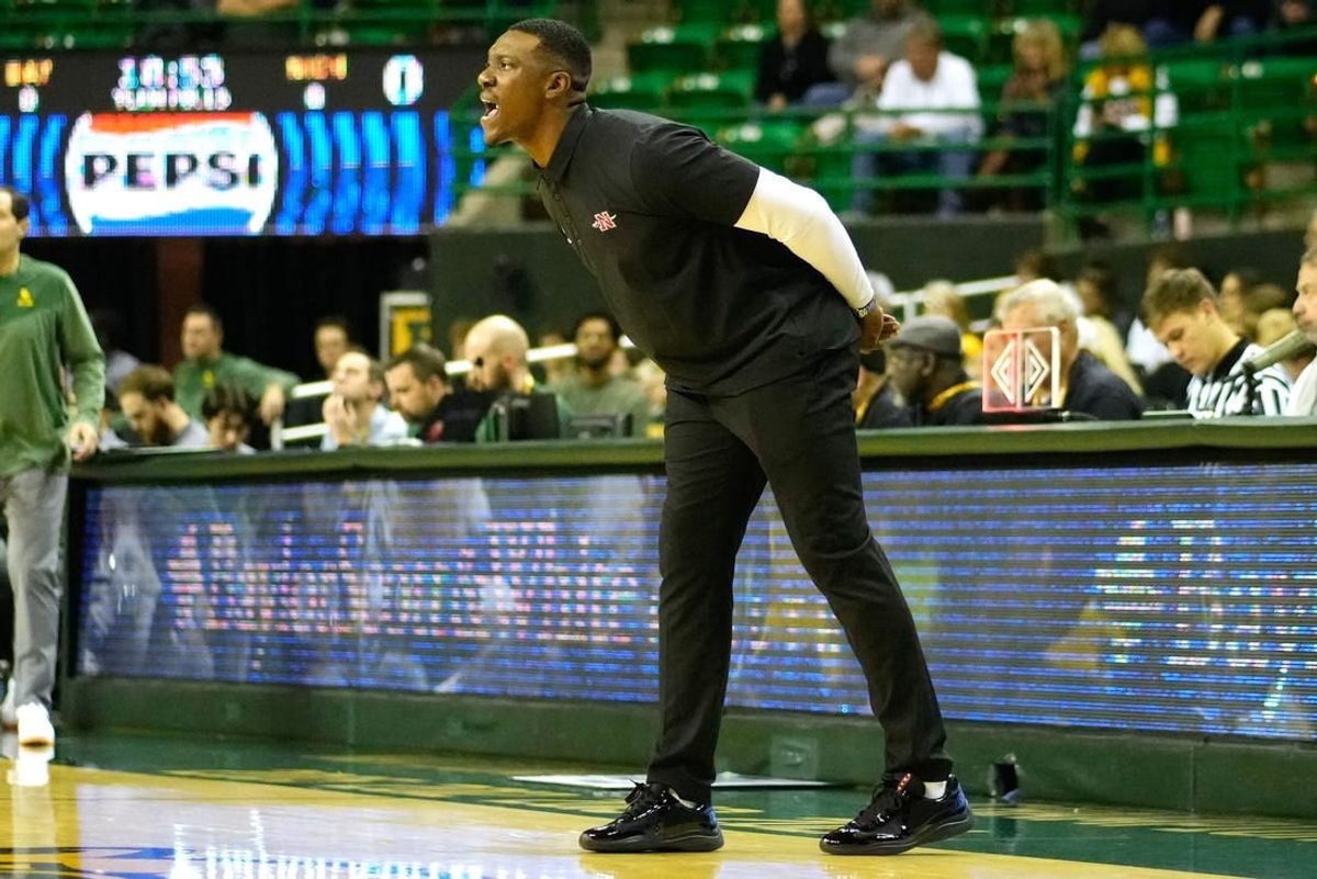 Nov 28, 2023; Waco, Texas, USA;  Nicholls State Colonels head coach Tevon Saddler calls a play against the Baylor Bears during the first half at Ferrell Center.
