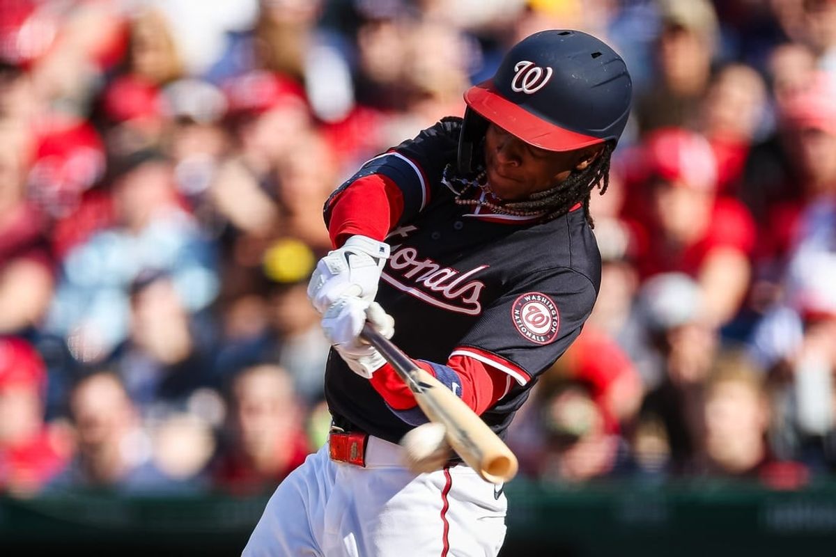 Apr 20, 2024; Washington, District of Columbia, USA; Washington Nationals shortstop CJ Abrams (5) at bat against the Houston Astros during the second inning at Nationals Park.