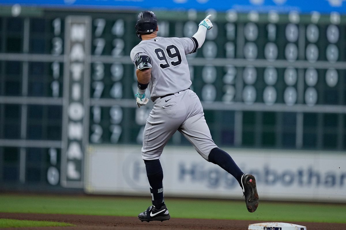Aaron Judge rounds the bases after hitting a home run