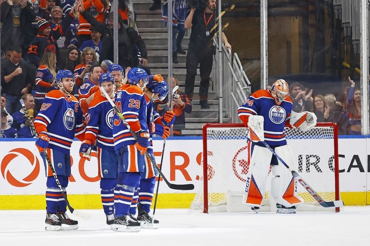 Jan 16, 2024; Edmonton, Alberta, CAN; The Edmonton Oilers celebrate a goal scored by defensemen Evan Bouchard (2) during the third period against the Toronto Maple Leafs at Rogers Place.