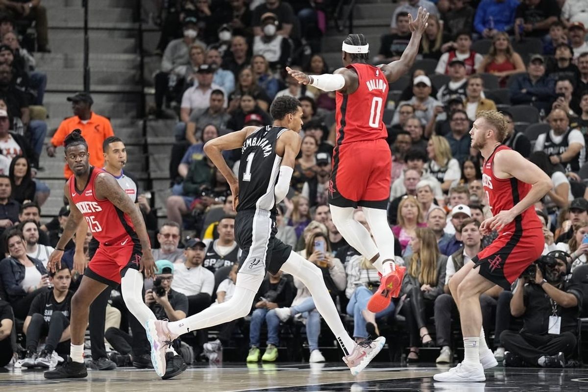 Mar 12, 2024; San Antonio, Texas, USA; San Antonio Spurs forward Victor Wembanyama (1) drives to the basket during the first half against the Houston Rockets at Frost Bank Center.