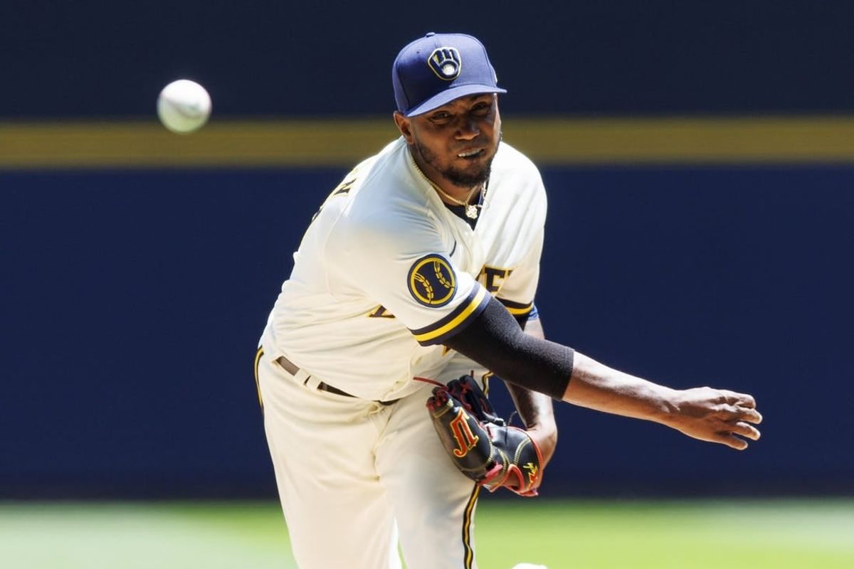 Jul 3, 2023; Milwaukee, Wisconsin, USA;  Milwaukee Brewers pitcher Julio Teheran (49) throws a pitch during the first inning against the Chicago Cubs at American Family Field.