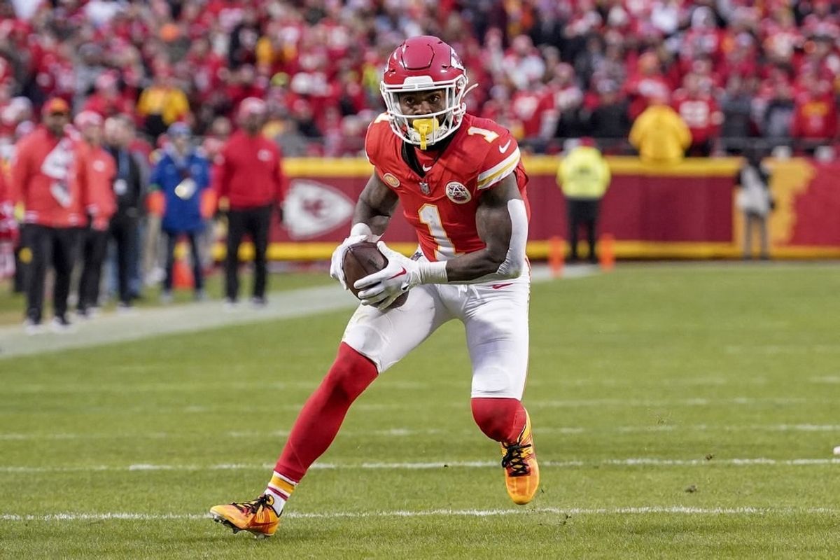 Dec 10, 2023; Kansas City, Missouri, USA; Kansas City Chiefs running back Jerick McKinnon (1) runs the ball against the Buffalo Bills during the first half at GEHA Field at Arrowhead Stadium.