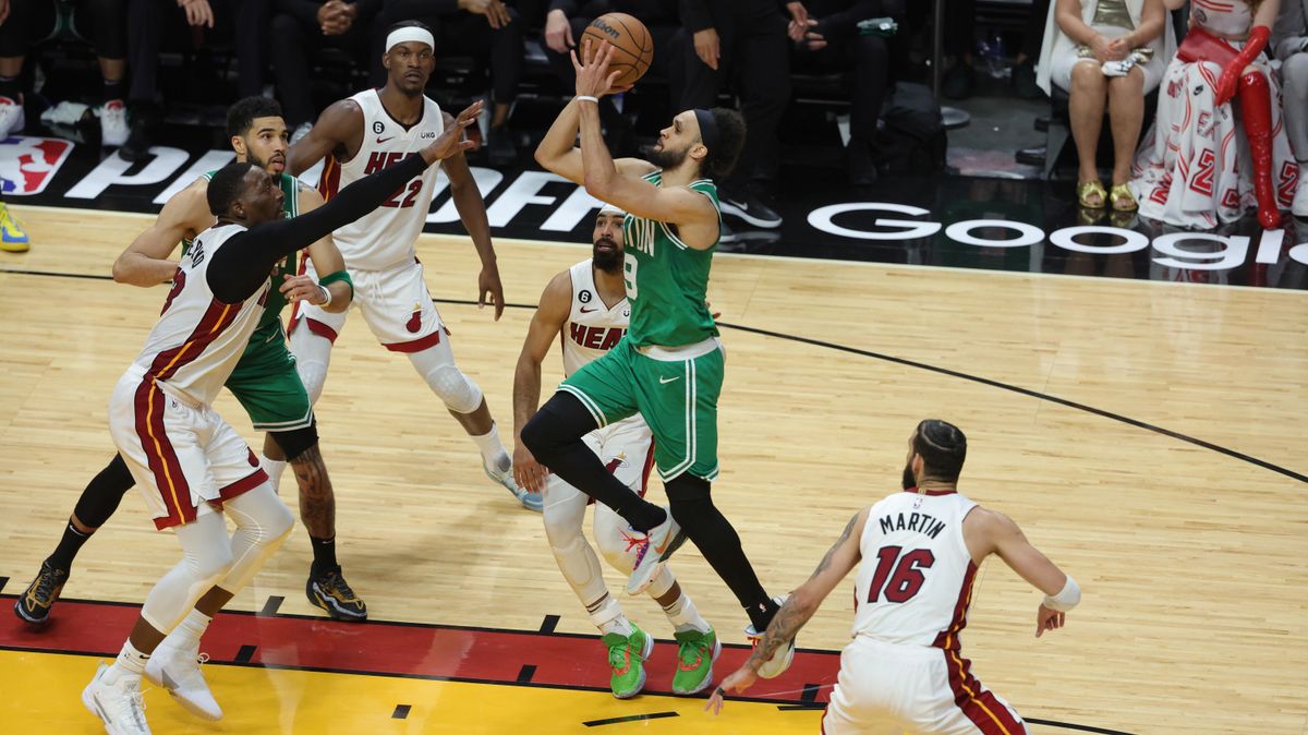 Boston’s Derrick White drives to the basket ahead of Bam Adebayo during the fourth quarter in game six of the Eastern Conference Finals at Kaseya Center.