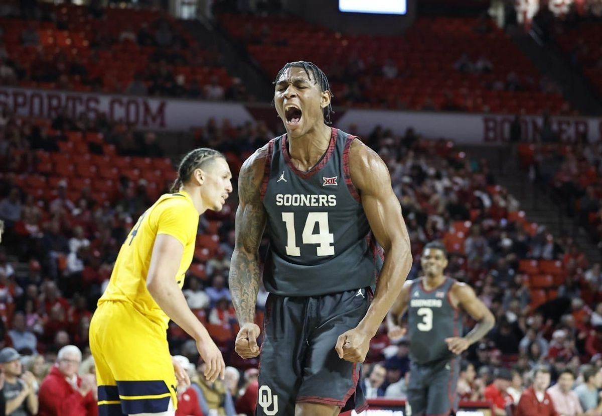 Jan 17, 2024; Norman, Oklahoma, USA; Oklahoma Sooners forward Jalon Moore (14) celebrates after scoring against the West Virginia Mountaineers during the second half at Lloyd Noble Center.