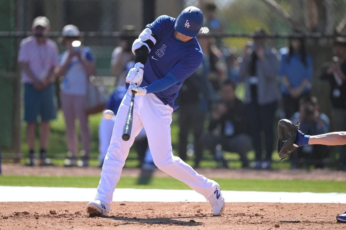 Feb 19, 2024; Glendale, AZ, USA; Los Angeles Dodgers designated hitter Shohei Ohtani (17) takes batting practice during spring training at Camelback Ranch.
