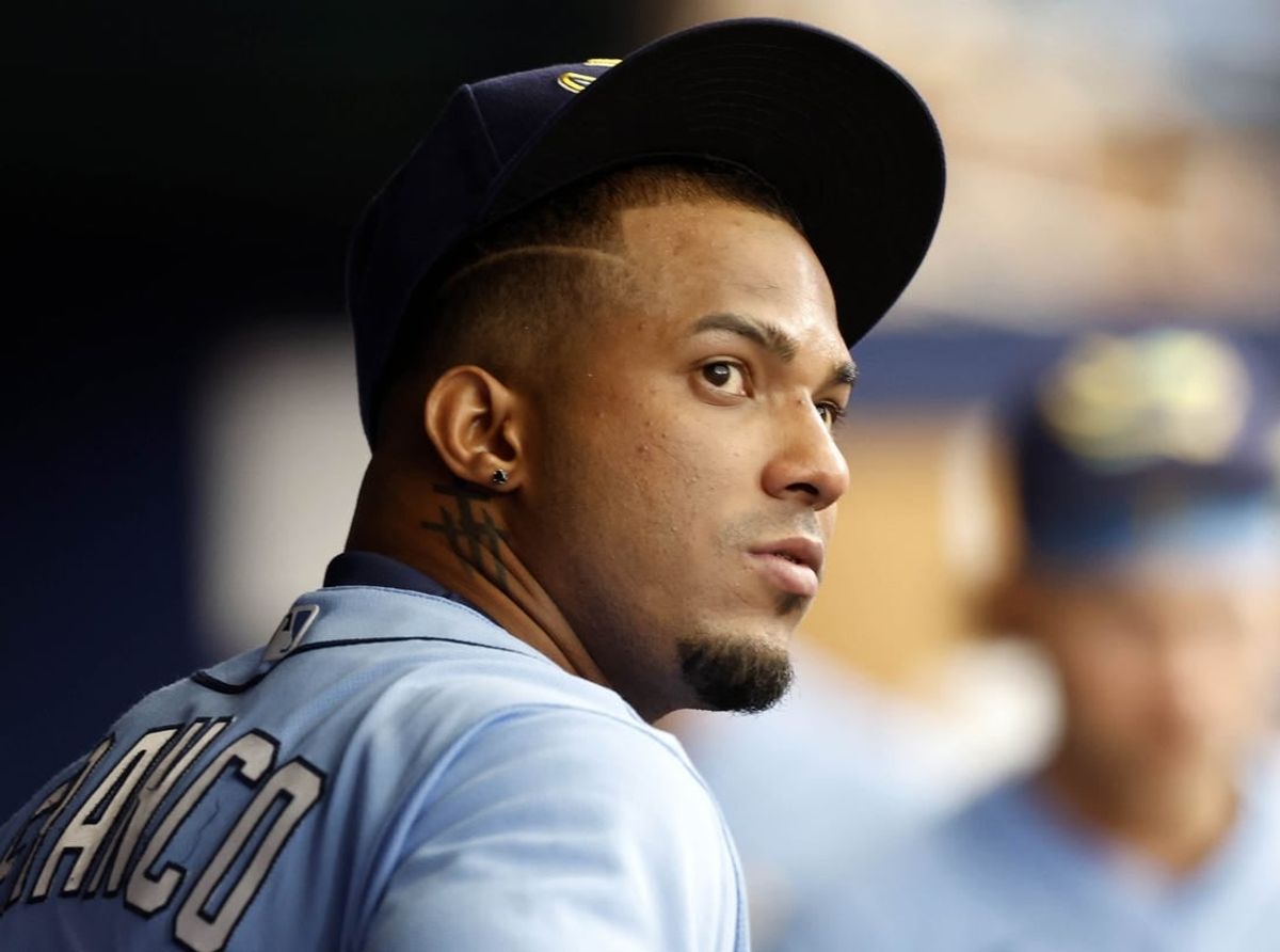 Apr 24, 2022; St. Petersburg, Florida, USA; Tampa Bay Rays shortstop Wander Franco (5) looks on in the dugout against the Boston Red Sox \ at Tropicana Field.