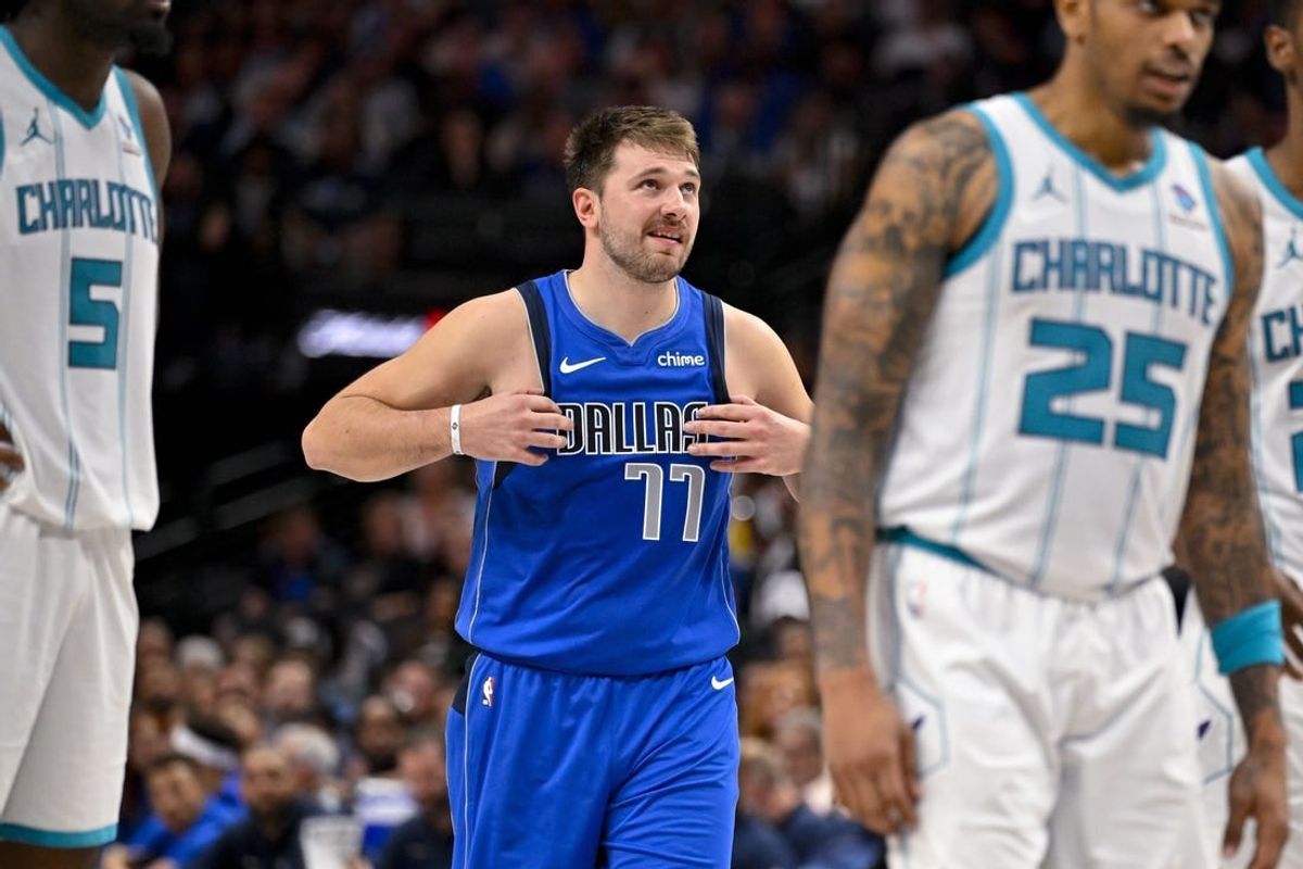 Nov 5, 2023; Dallas, Texas, USA; Dallas Mavericks guard Luka Doncic (77) reacts to receiving a technical foul against the Charlotte Hornets during the second half at the American Airlines Center.