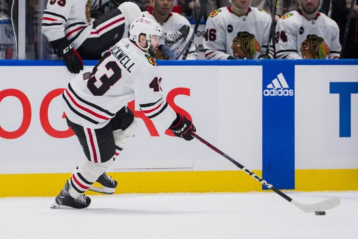 Jan 22, 2024; Vancouver, British Columbia, CAN; Chicago Blackhawks forward Colin Blackwell (43) handles the puck against the Vancouver Canucks in the third period at Rogers Arena. Canucks won 2-0.