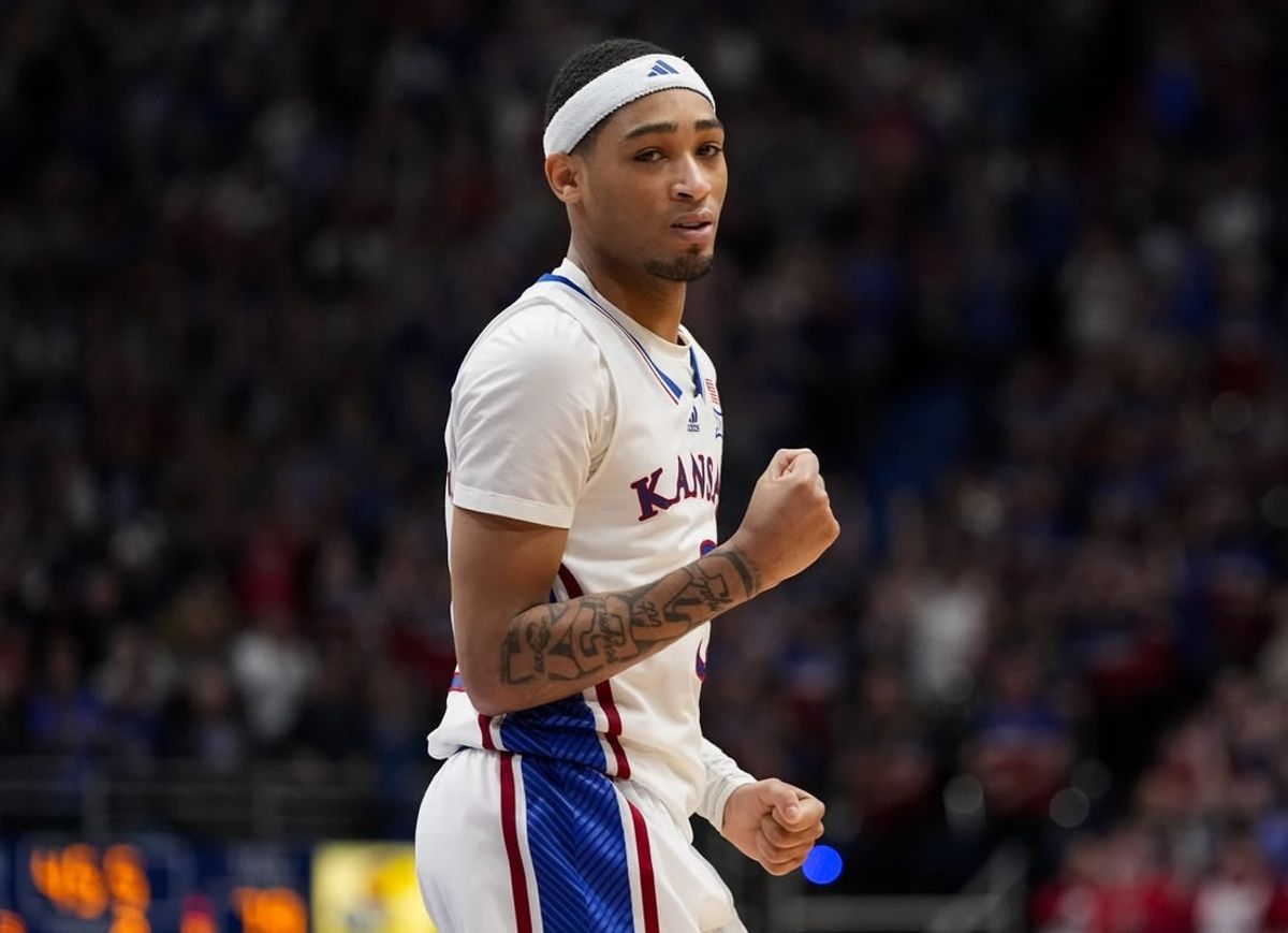 Jan 6, 2024; Lawrence, Kansas, USA; Kansas Jayhawks guard Dajuan Harris Jr. (3) celebrates after scoring late in the second half against the TCU Horned Frogs at Allen Fieldhouse.