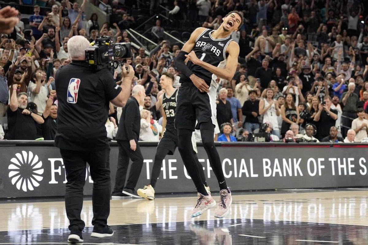 Apr 12, 2024; San Antonio, Texas, USA; San Antonio Spurs forward Victor Wembanyama (1) reacts after a victory over the Denver Nuggets at Frost Bank Center.