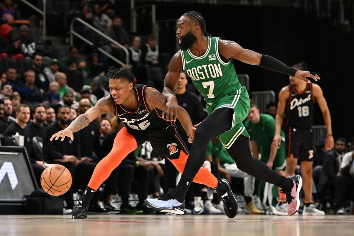Mar 22, 2024; Detroit, Michigan, USA; Detroit Pistons guard Marcus Sasser (25) loses control of his dribble while being defended by Boston Celtics guard Jaylen Brown (7) in the third quarter at Little Caesars Arena.