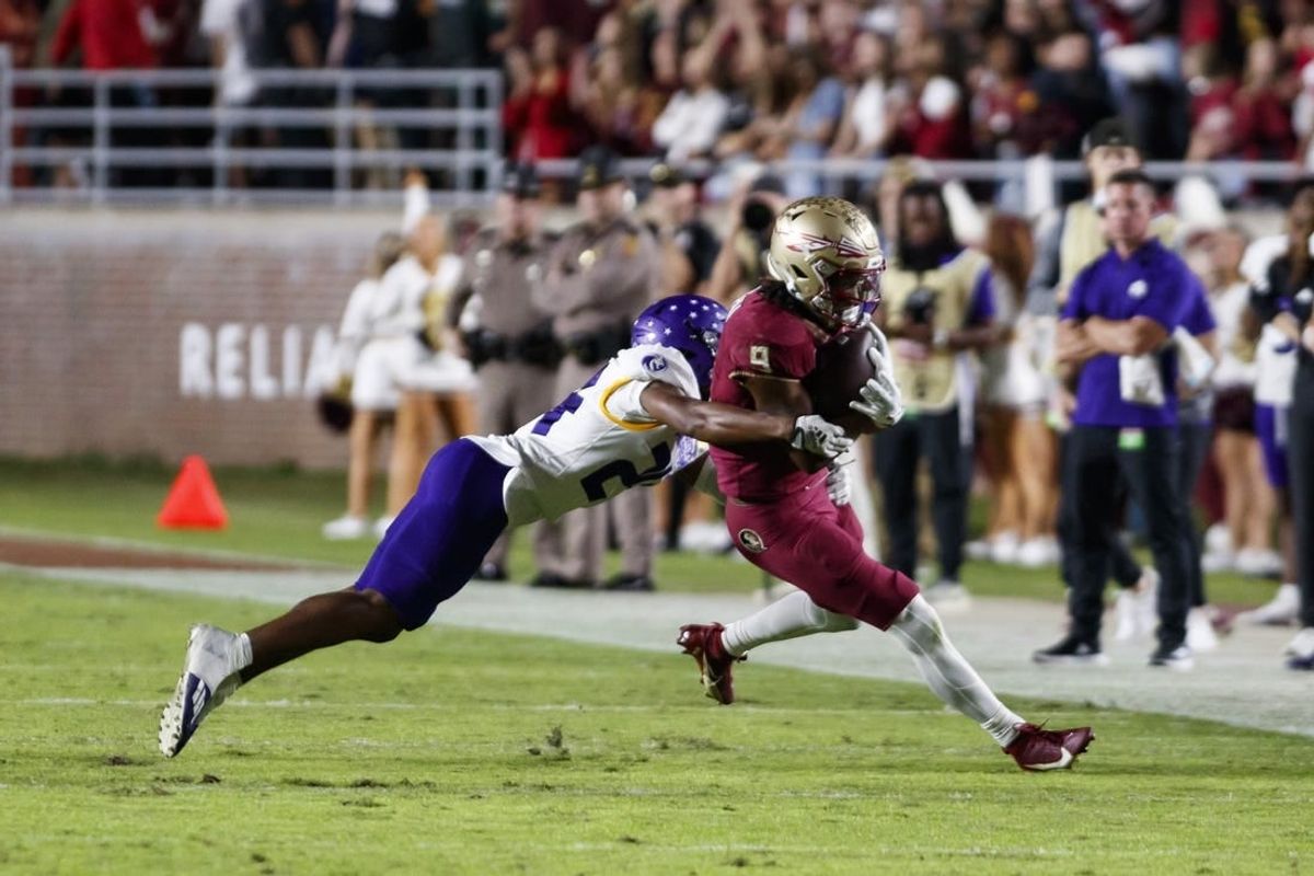 Nov 18, 2023; Tallahassee, Florida, USA; Florida State Seminoles running back Lawrance Toafili (9) tackled by North Alabama Lions defensive back Cameron Jamar (24) during the second quarter at Doak S. Campbell Stadium.