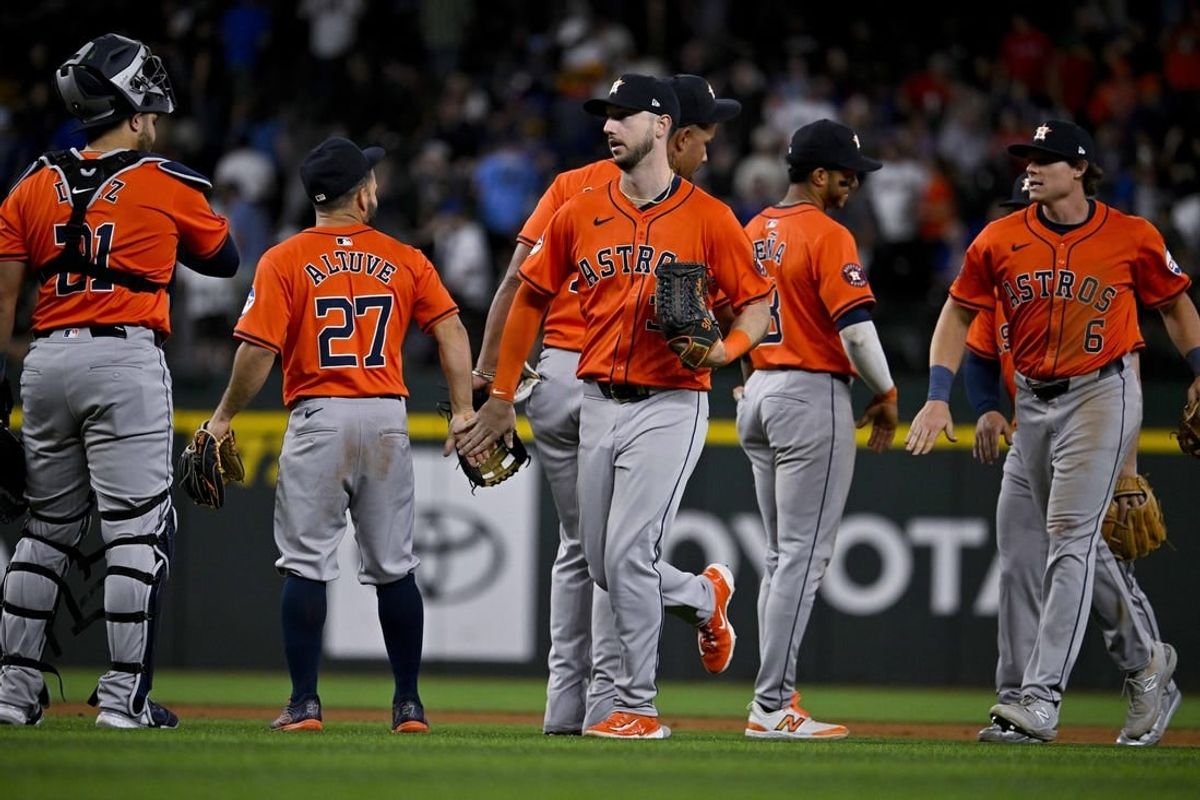 Apr 7, 2024; Arlington, Texas, USA; Houston Astros catcher Yainer Diaz (21) and second baseman Jose Altuve (27) and right fielder Kyle Tucker (30) and shortstop Jeremy Pena (3) and center fielder Jake Meyers (6) celebrate after the Astros defeat the Texas Rangers at Globe Life Field.