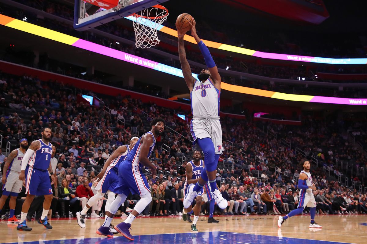 Andre Drummond gets to the basket ahead of Joel Embiid when the Pistons and 76ers faced off in December of 2019.
