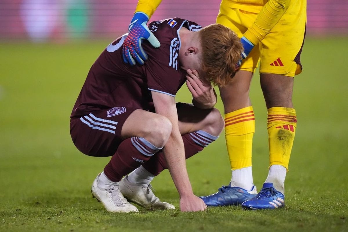 Oct 15, 2023; Denver, CO, USA; Colorado Rapids goalkeeper Abe Rodriguez (26) consoles midfielder Oliver Larraz (18) following the loss to the Austin FC II following a shoot out in the Western Conference Final at Dick's Sporting Goods Park.