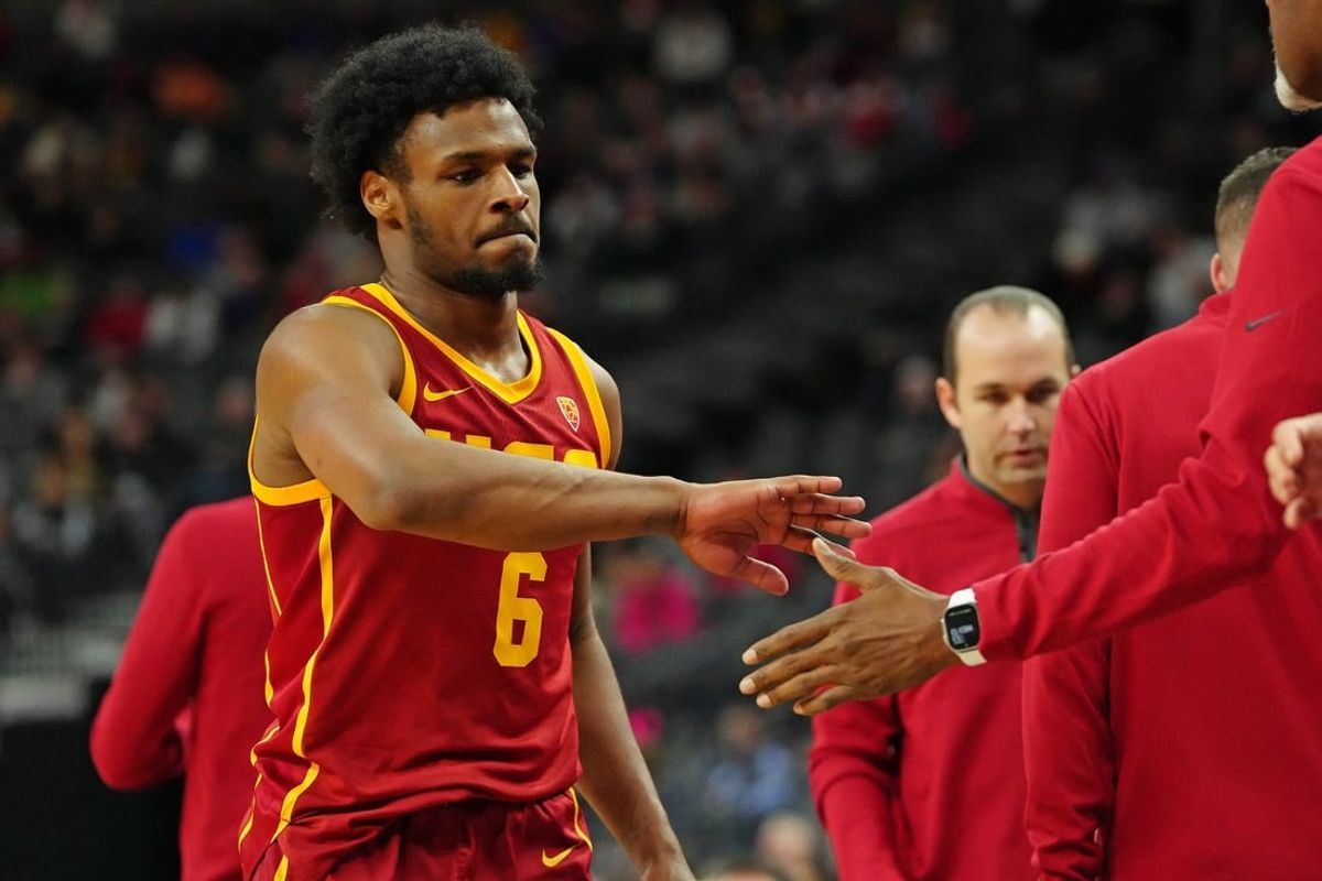 Mar 13, 2024; Las Vegas, NV, USA; USC Trojans guard Bronny James (6) returns to the bench in a game against the Washington Huskies during the second half at T-Mobile Arena.
