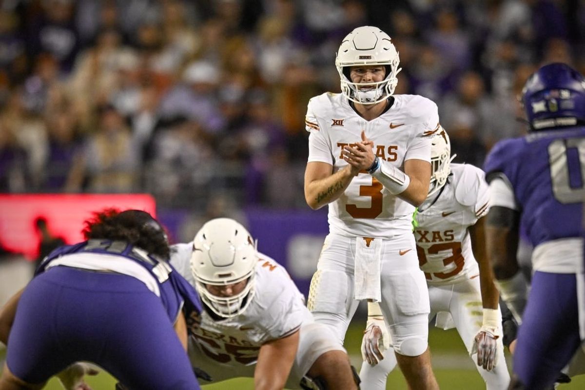 Nov 11, 2023; Fort Worth, Texas, USA; Texas Longhorns quarterback Quinn Ewers (3) in action during the game between the TCU Horned Frogs and the Texas Longhorns at Amon G. Carter Stadium.