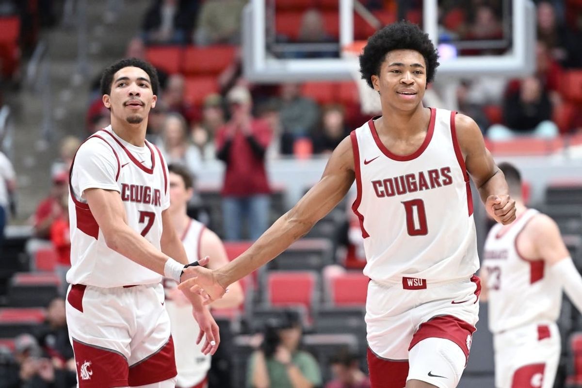 Jan 24, 2024; Pullman, Washington, USA; Washington State Cougars forward Jaylen Wells (0) celebrates a three-pointer during a game against the Utah Utes in the second half at Friel Court at Beasley Coliseum. Washington State won 79-57.