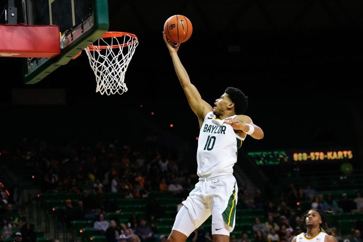 Nov 9, 2023; Waco, Texas, USA;  Baylor Bears guard RayJ Dennis (10) scores a layup against the John Brown Golden Eagles during the second half at Ferrell Center.