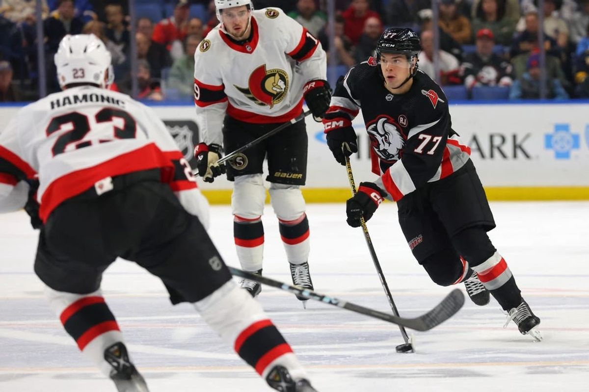 Jan 11, 2024; Buffalo, New York, USA;  Buffalo Sabres right wing JJ Peterka (77) looks to make a pass during the third period against the Ottawa Senators at KeyBank Center.