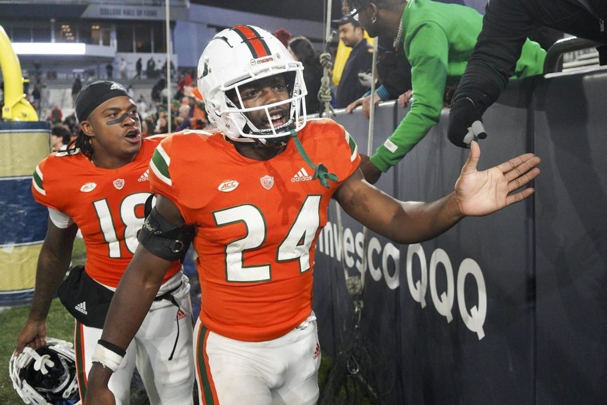 Nov 12, 2022; Atlanta, Georgia, USA; Miami Hurricanes safety Kamren Kinchens (24) celebrates with fans after a victory against the Georgia Tech Yellow Jackets at Bobby Dodd Stadium.