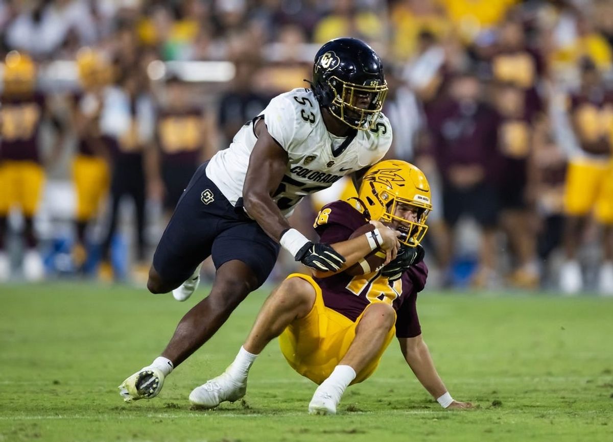 Oct 7, 2023; Tempe, Arizona, USA; Arizona State Sun Devils quarterback Trenton Bourguet (16) is sacked by Colorado Buffaloes defensive end Arden Walker (53) in the second half at Mountain America Stadium.