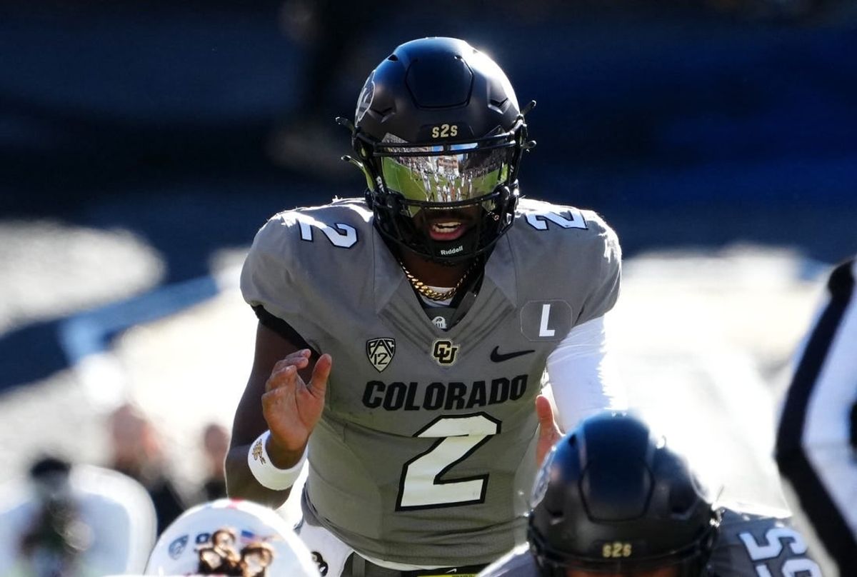 Nov 11, 2023; Boulder, Colorado, USA; Colorado Buffaloes quarterback Shedeur Sanders (2) at the line of scrimmage in the first half against the Arizona Wildcats at Folsom Field.