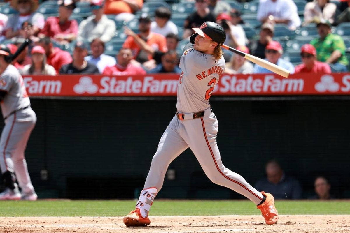 Apr 24, 2024; Anaheim, California, USA;  Baltimore Orioles shortstop Gunnar Henderson (2) hits a home run during the third inning against the Los Angeles Angels at Angel Stadium.