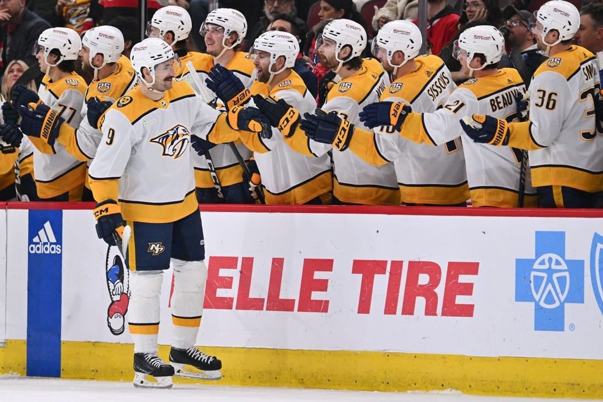 Apr 12, 2024; Chicago, Illinois, USA; Nashville Predators forward Filip Forsberg (9) celebrates with the bench after scoring a goal in the second period against the Chicago Blackhawks at United Center.