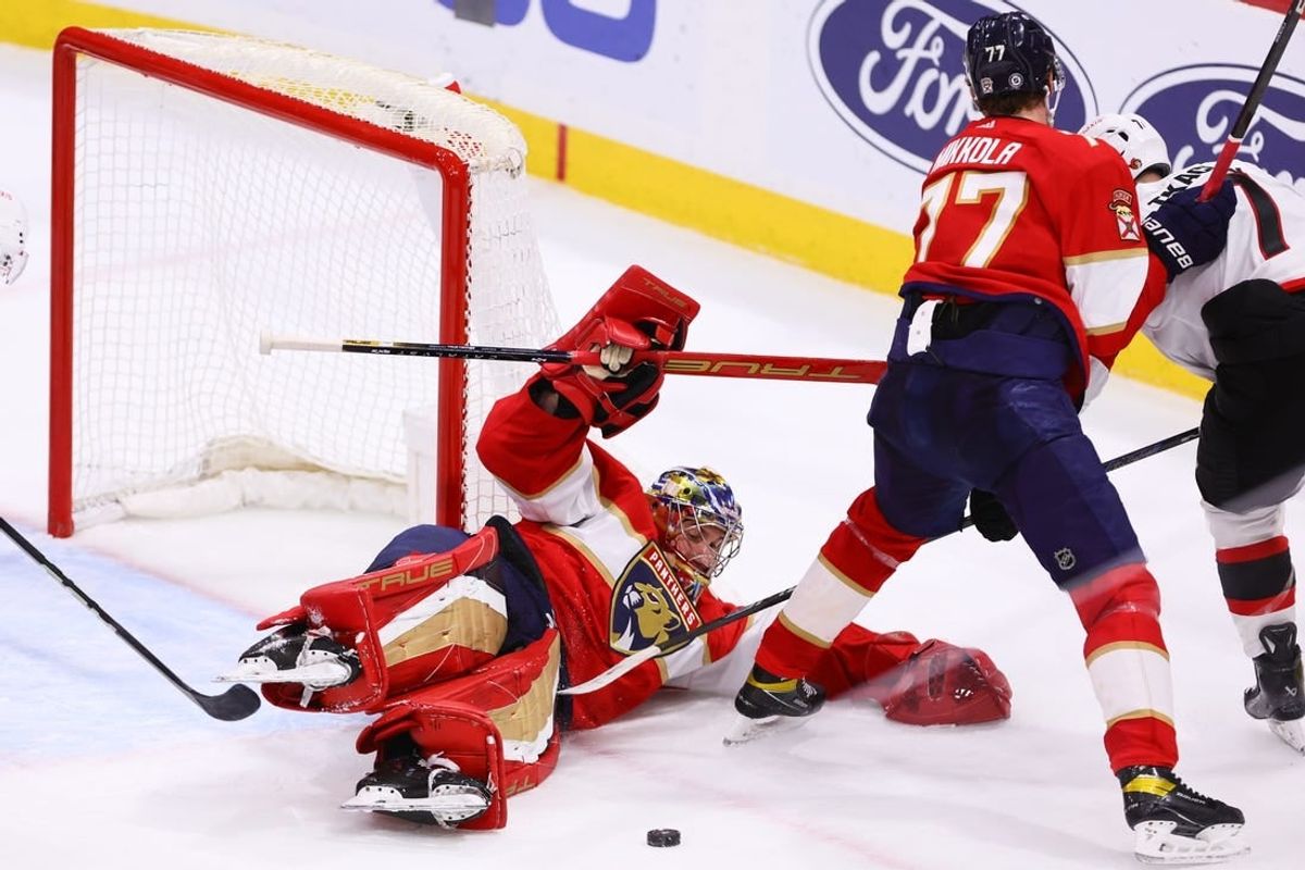 Apr 9, 2024; Sunrise, Florida, USA; Florida Panthers goaltender Anthony Stolarz (41) makes a save after a shot by Ottawa Senators left wing Brady Tkachuk (7) during the third period at Amerant Bank Arena.