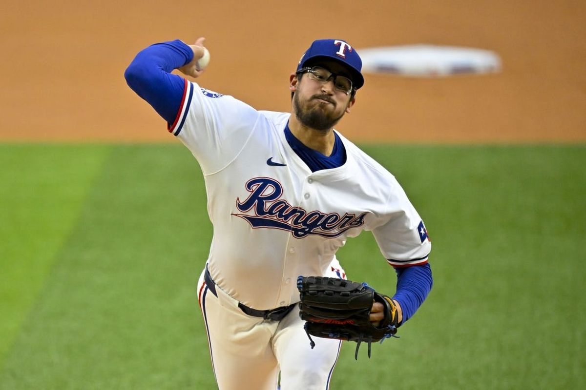 Apr 23, 2024; Arlington, Texas, USA; Texas Rangers starting pitcher Dane Dunning (33) pitches against the Seattle Mariners during the first inning at Globe Life Field.