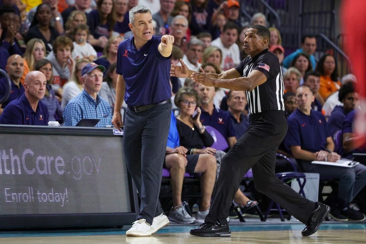 Nov 20, 2023; Fort Myers, Florida, USA;  Virginia Cavaliers head coach Tony Bennett reacts after a play against the Wisconsin Badgers in the first half during the Fort Myers Top-Off at Suncoast Credit Union Arena.