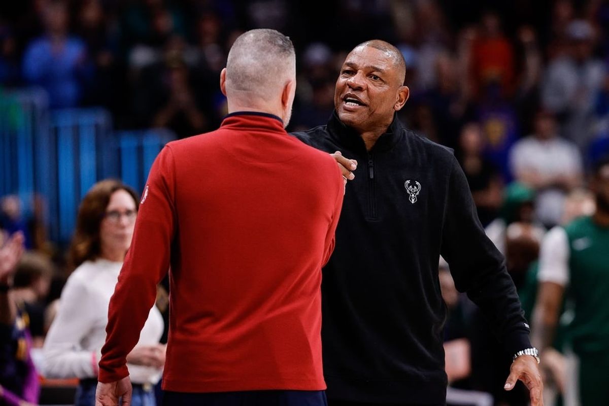 Jan 29, 2024; Denver, Colorado, USA; Milwaukee Bucks head coach Doc Rivers (R) greets Denver Nuggets head coach Michael Malone (L) after the game at Ball Arena.