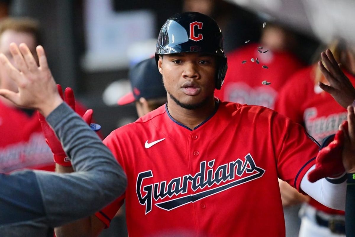 Aug 22, 2023; Cleveland, Ohio, USA; Cleveland Guardians designated hitter Oscar Gonzalez (39) celebrates after hitting a home run during the fourth inning against the Los Angeles Dodgers at Progressive Field.