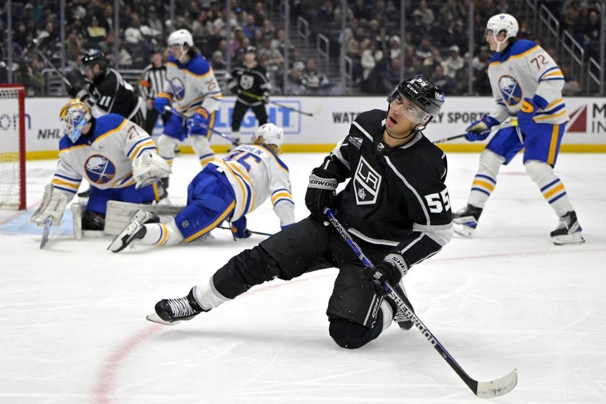 Jan 24, 2024; Los Angeles, California, USA; Los Angeles Kings right wing Quinton Byfield (55) reacts after a save off a shot on goal by Buffalo Sabres goaltender Devon Levi (27) in the second period at Crypto.com Arena.