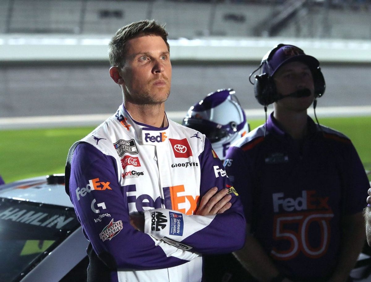 Denny Hamlin watches the action on the giant TV screne towering over pit road, Wednesday February 15, 2023 during Daytona 500 qualifying.

Dtb Daytona 500 Qualifying 3