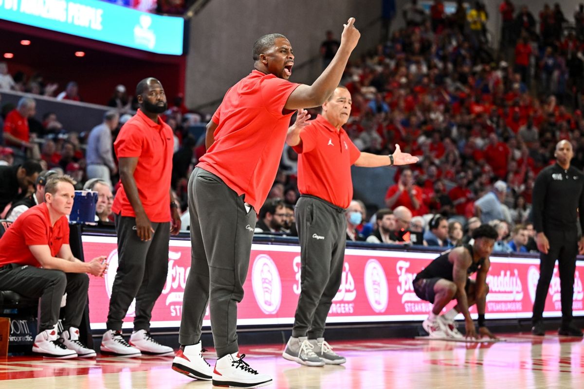Feb 19, 2023; Houston, Texas, USA; Houston Cougars assistant coach Quannas White reacts during the second half against the Memphis Tigers at Fertitta Center. Mandatory Credit: Maria Lysaker-Imagn Images