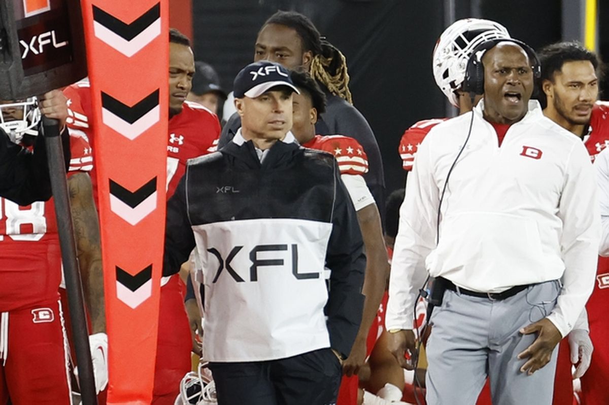 Feb 19, 2023; Washington, DC, USA; D.C. Defenders Head Coach Reggie Barlow (R) yells from the sidelines against the Seattle Sea Dragons at Audi Field. Mandatory Credit: Geoff Burke-Imagn Images