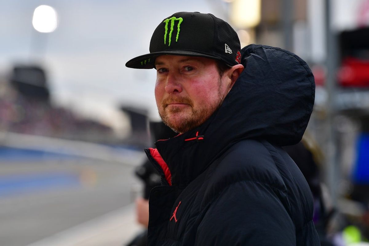 Feb 26, 2023; Fontana, California, USA; Kurt Busch reacts after his brother NASCAR Cup Series driver Kyle Busch (8) wins the Pala Casino 400 at Auto Club Speedway. Mandatory Credit: Gary A. Vasquez-Imagn Images