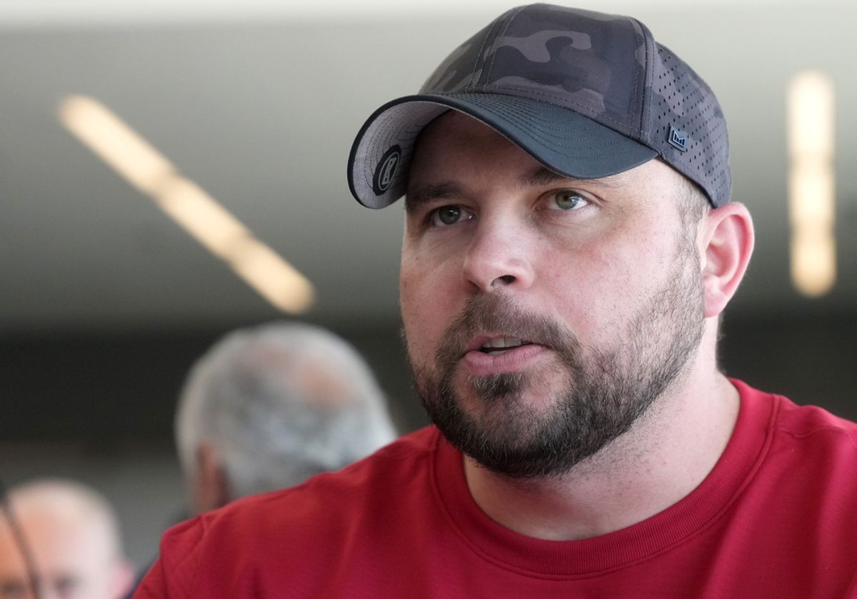 Arizona Cardinals offensive line coach Klayton Adams speaks with the media as he is introduced as a new hire with fellow coaches at the Cardinals facility in Tempe on March 8, 2023.

Nfl Cardinals Offensive Assistant Coaches Introduction