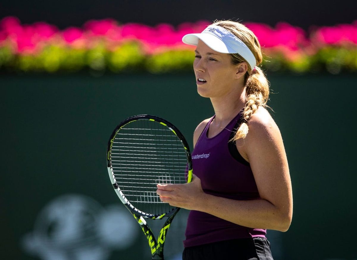Danielle Collins of the United States looks toward Dalma Galfi of Hungary before a serve during their round one match in the BNP Paribas Open at the Indian Wells Tennis Garden in Indian Wells, Calif., Thursday, March 9, 2023.