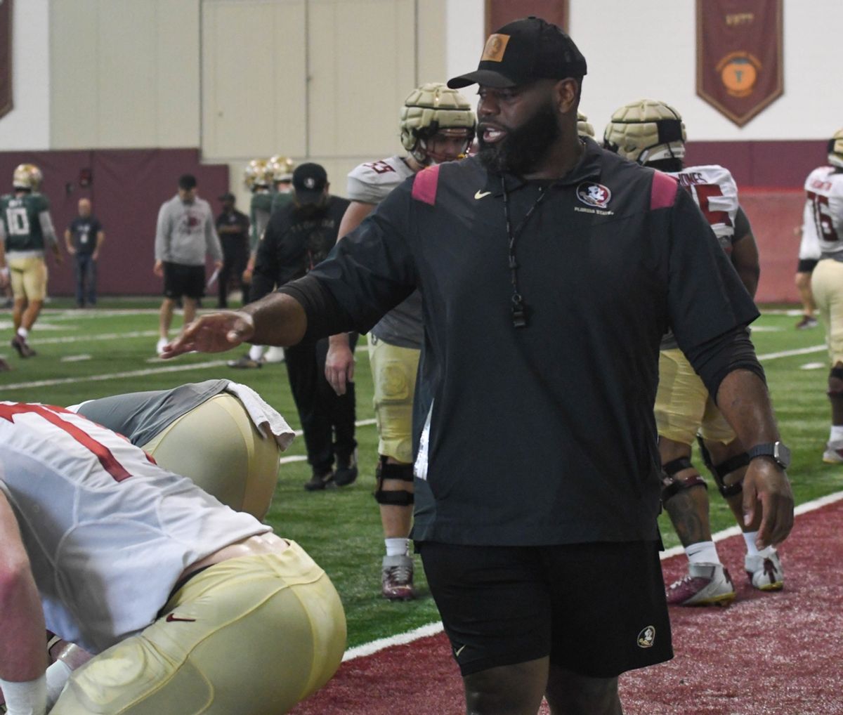 Florida State offensive coordinator Alex Atkins (right) coaches his offensive line up during an FSU spring football practice of the 2023 season on Friday, March 10, 2023.

Alex Atkins3 1 Of 1