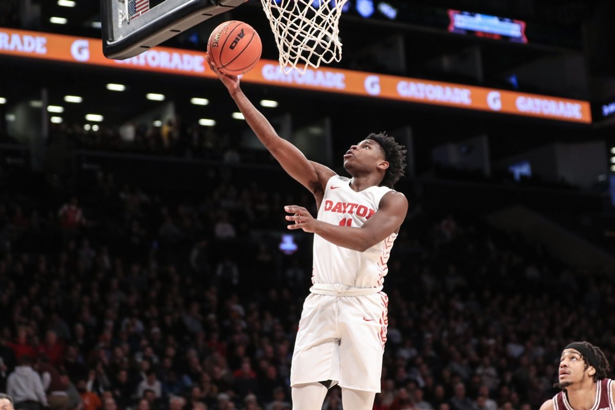 Mar 11, 2023; Brooklyn, NY, USA;  Dayton Flyers guard Malachi Smith (11) goes in for a layup in the first half against the Fordham Rams at Barclays Center. Mandatory Credit: Wendell Cruz-Imagn Images